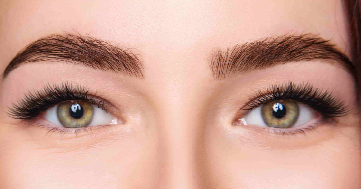 Woman showing full, healthy lashes after Eyelash & Brow Services in Lima, OH